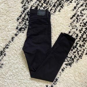 Ripped black Levi’s jeans